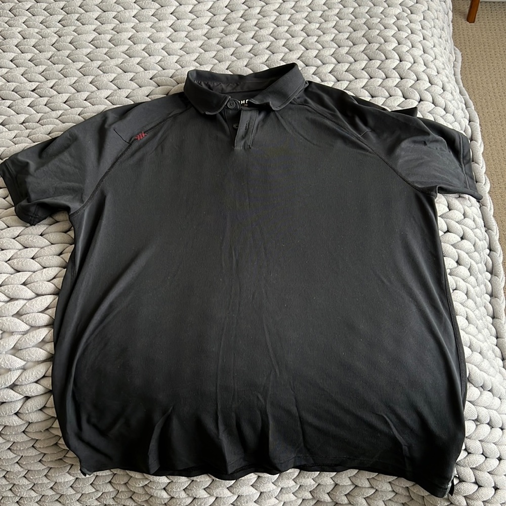 Rhone — large —- black polo